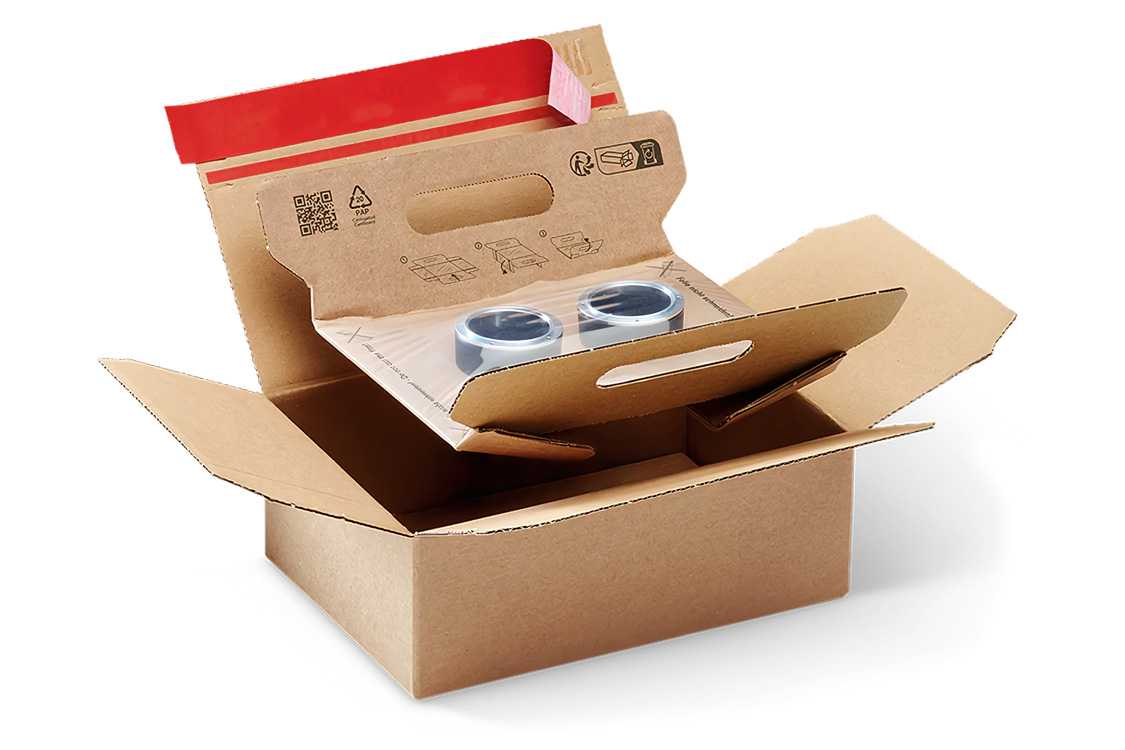 Boîte carton à film de calage intégré pour envoi postal ultra-sécurisé